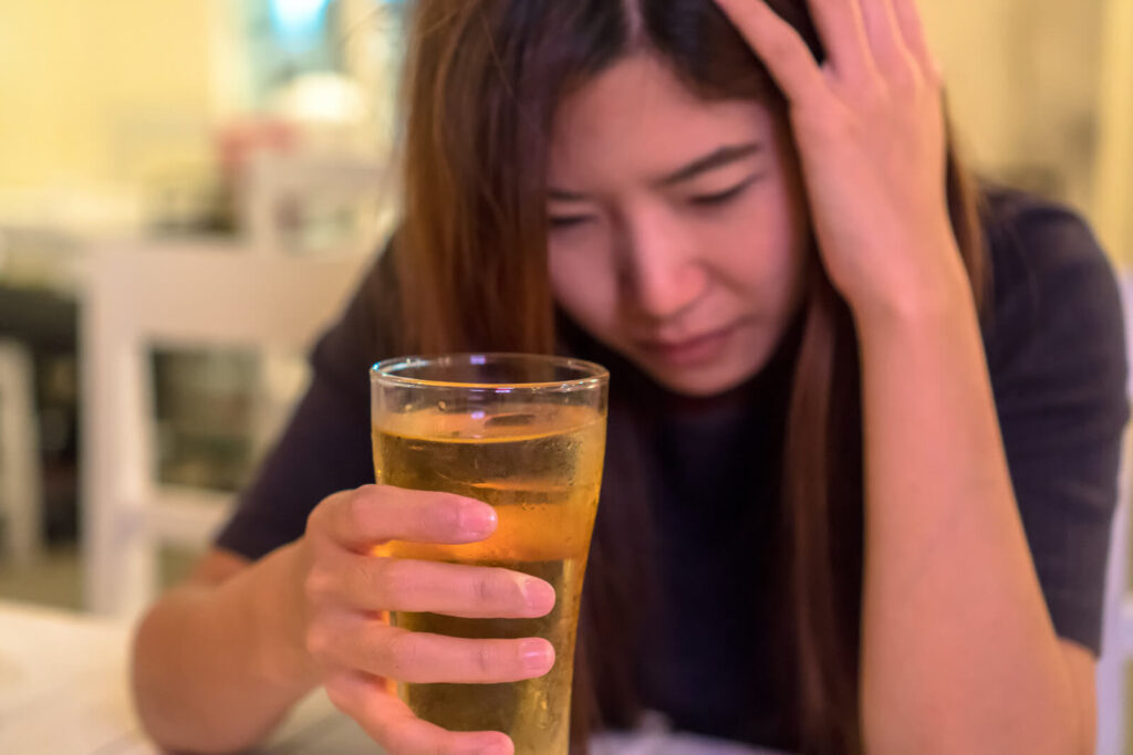 asian woman drinking